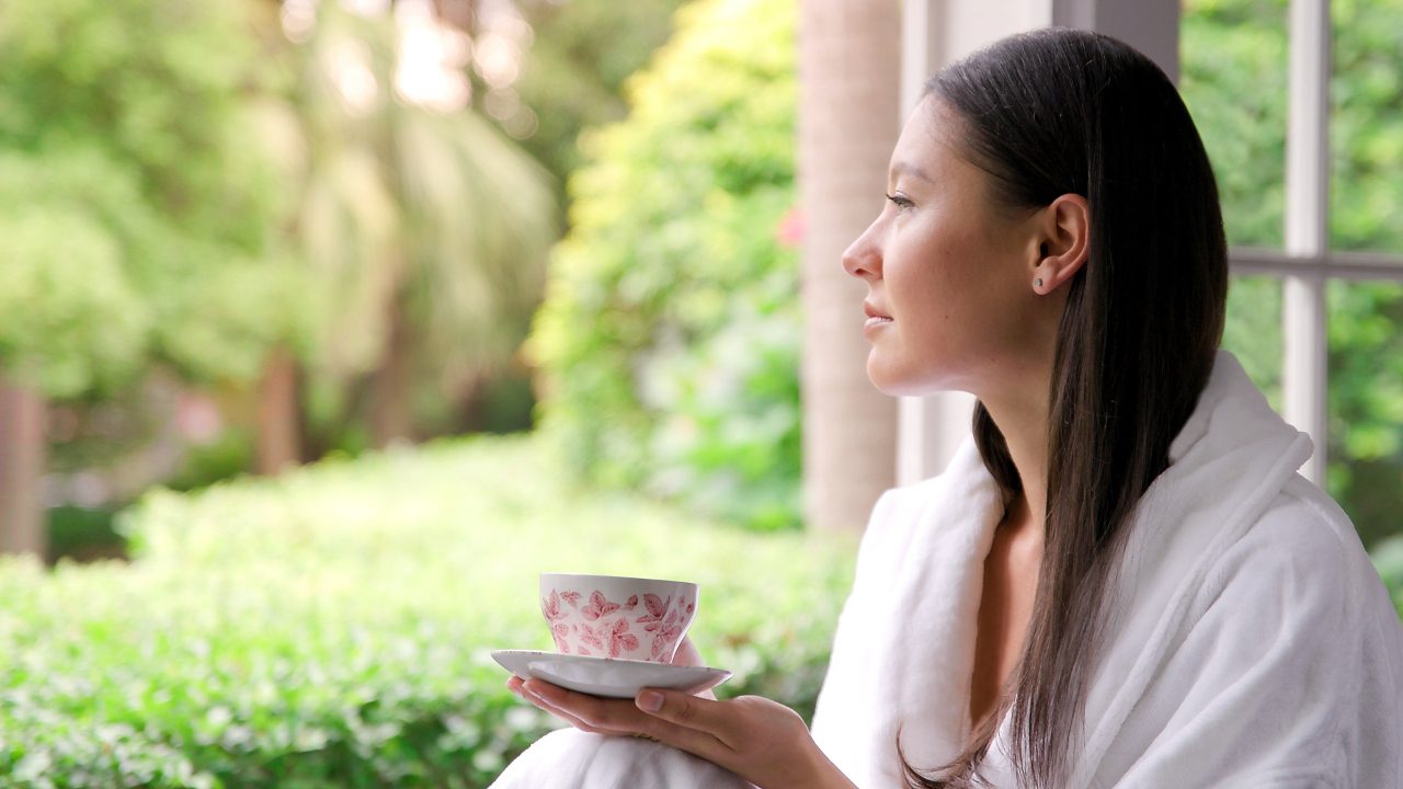 A Woman Enjoying Tea